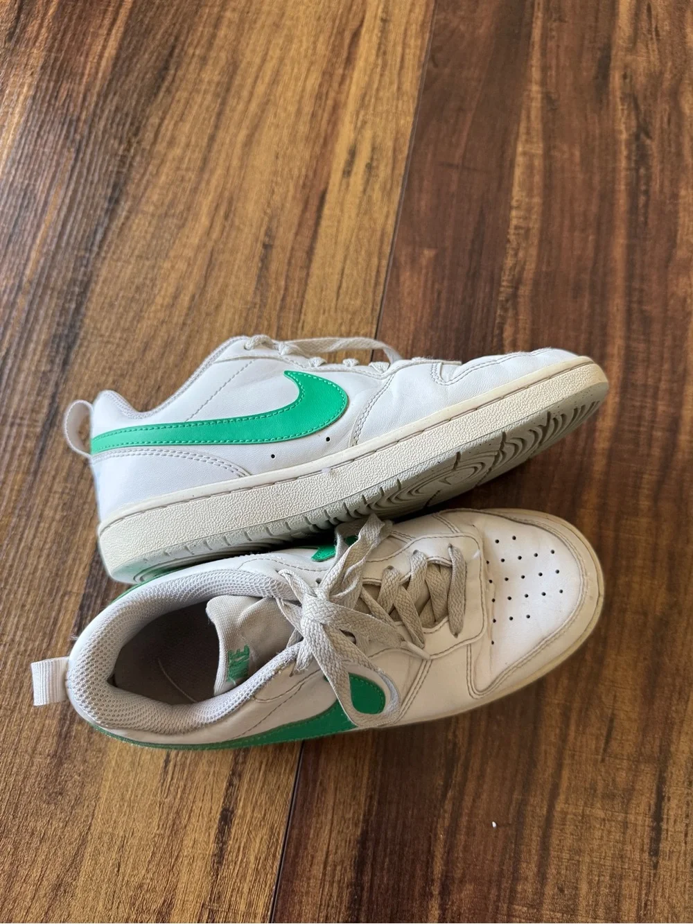 Nike White Low-Top Sneakers with Green Swoosh